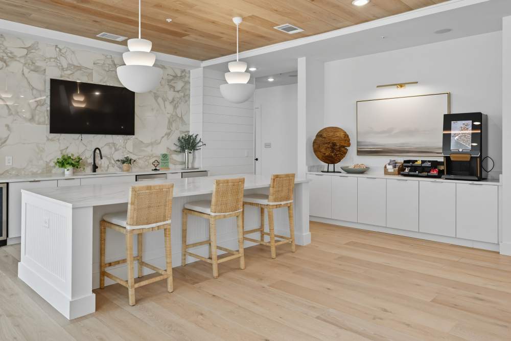 Resident lounge featuring coffee espresso bar at Wilton Palm Coast in Palm Coast, Florida