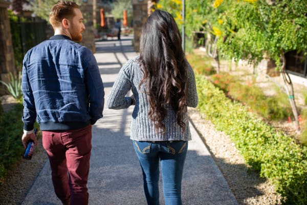 Residents out for a walk near San Posada in Mesa, Arizona