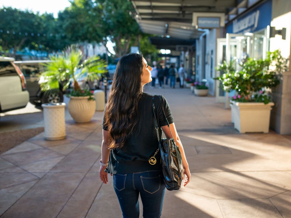 Resident enjoying walking downtown near San Cervantes in Chandler, Arizona