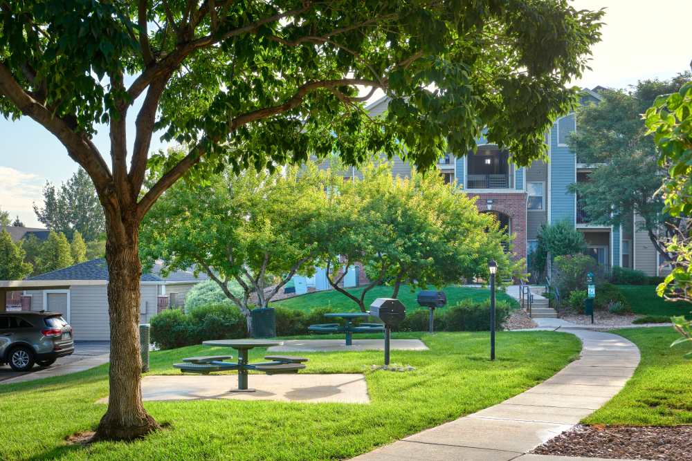 View of the dark park at Promenade at Hunter's Glen Apartments in Thornton, Colorado