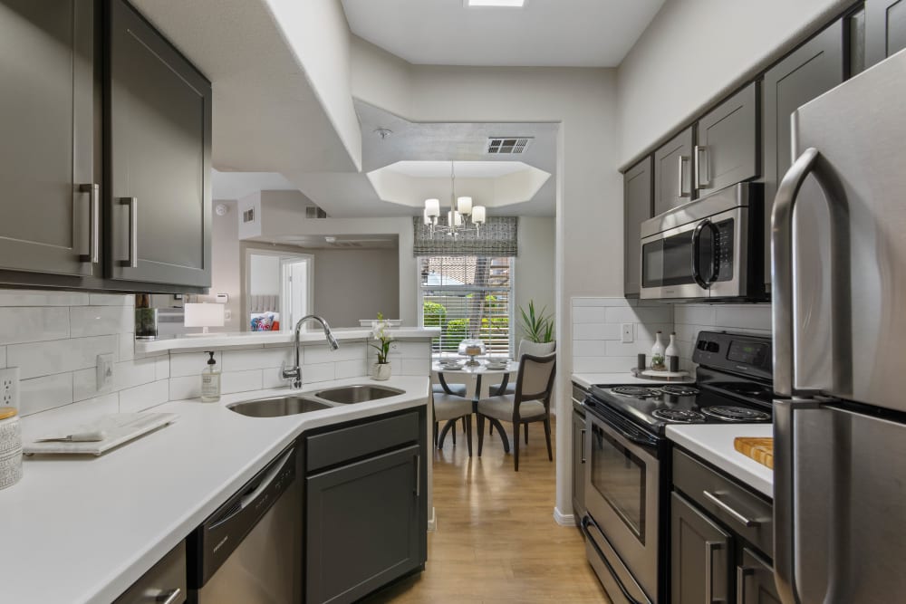 Kitchen featuring stainless steel appliances at Sonoran Vista Apartments in Scottsdale, Arizona