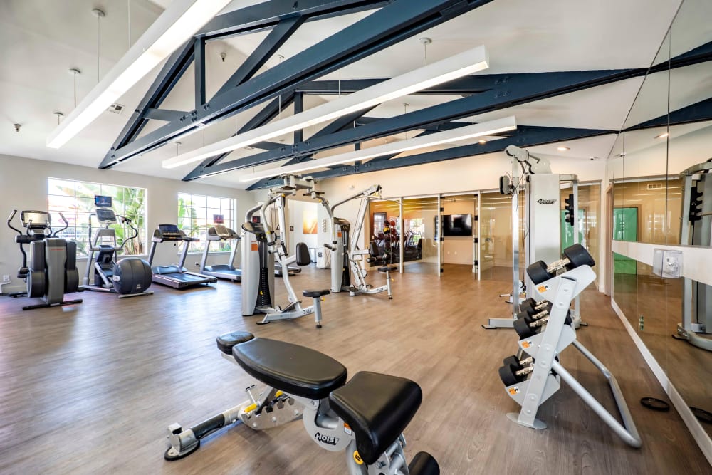 Fitness center with plenty of individual workout stations at Sierra Del Oro Apartments in Corona, California