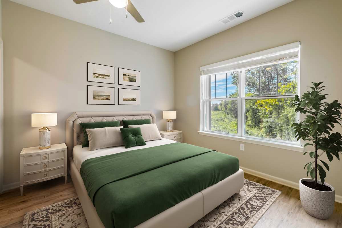 Bedroom with large window at Jefferson Green in Louisville, Kentucky