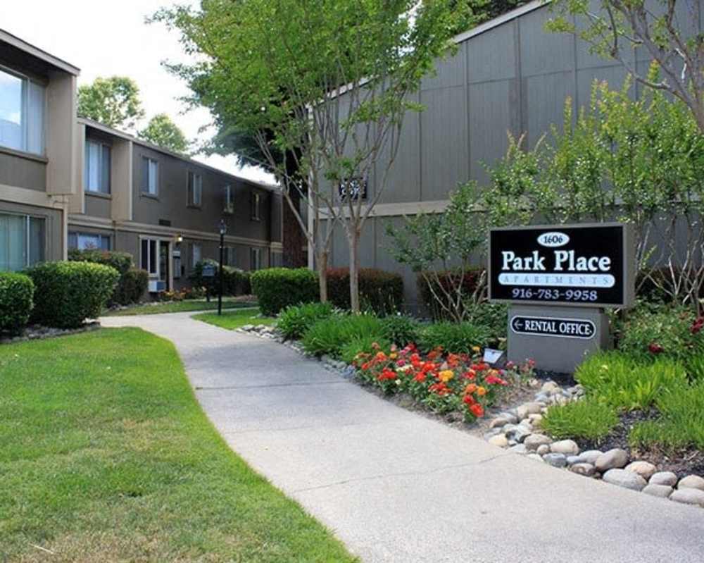 Welcome sign along pathway at  Park Place Apartments in Roseville, California