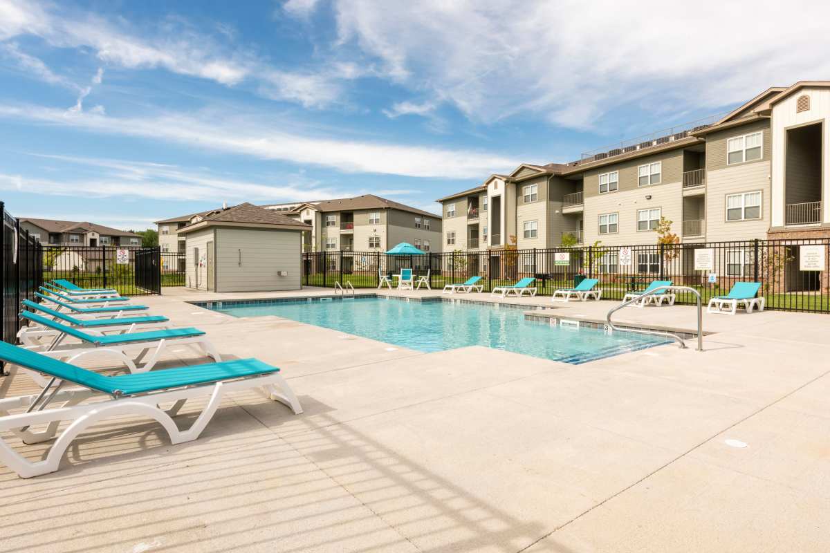 Swimming pool with view to community building at Jefferson Green in Louisville, Kentucky