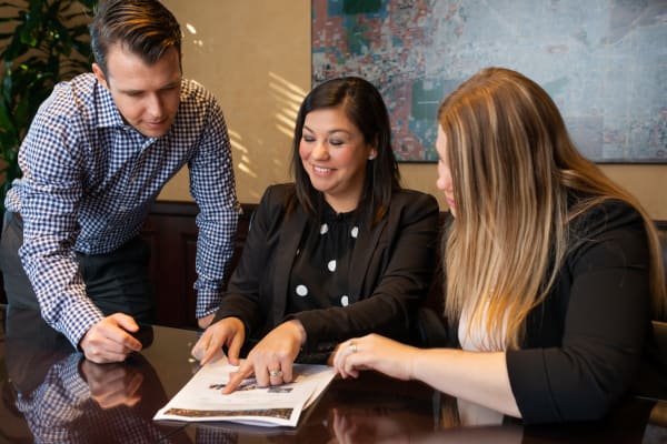 Investors discussing a project with Mark-Taylor