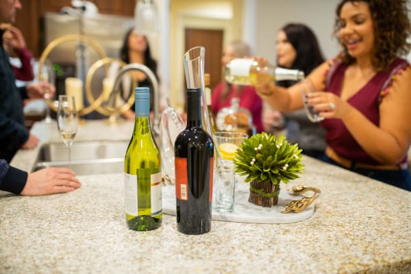 Residents enjoying drinks with friends in their new home at Remington Ranch in Litchfield Park, Arizona