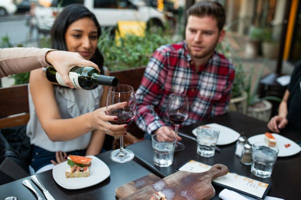 Residents enjoying dinner and drinks near San Prado in Glendale, Arizona