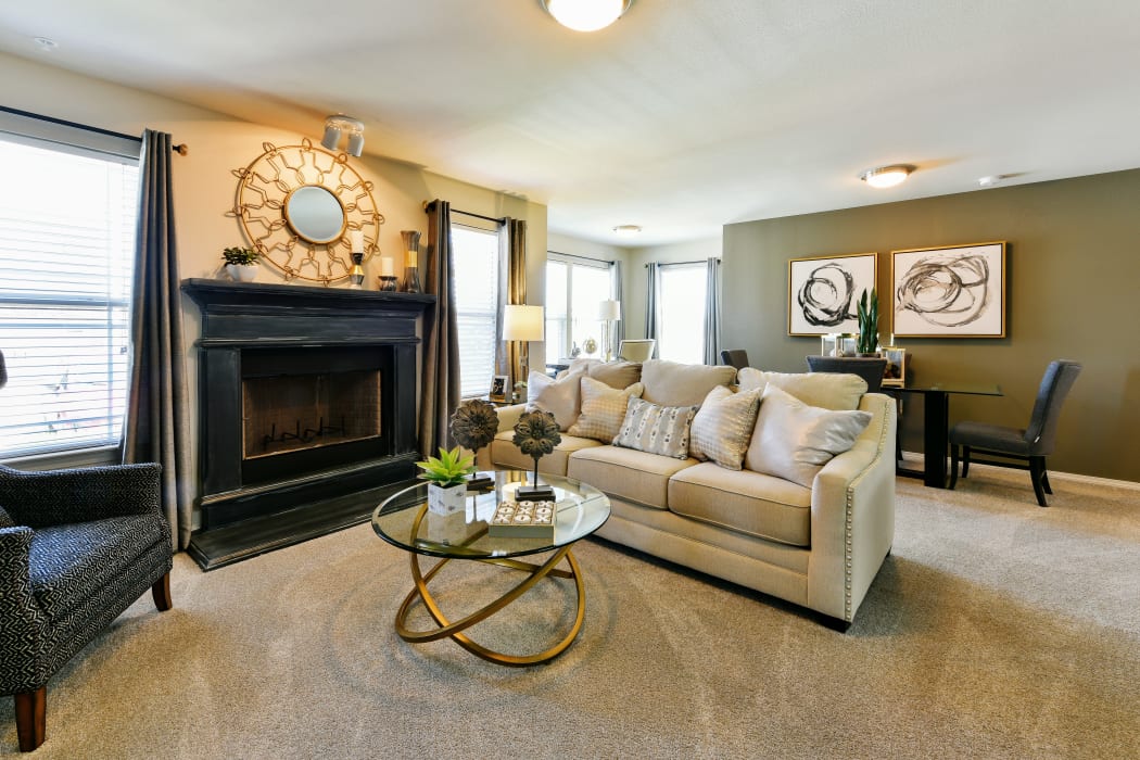 Beautiful, spacious living room at Cottages at Abbey Glen Apartments in Lubbock, Texas