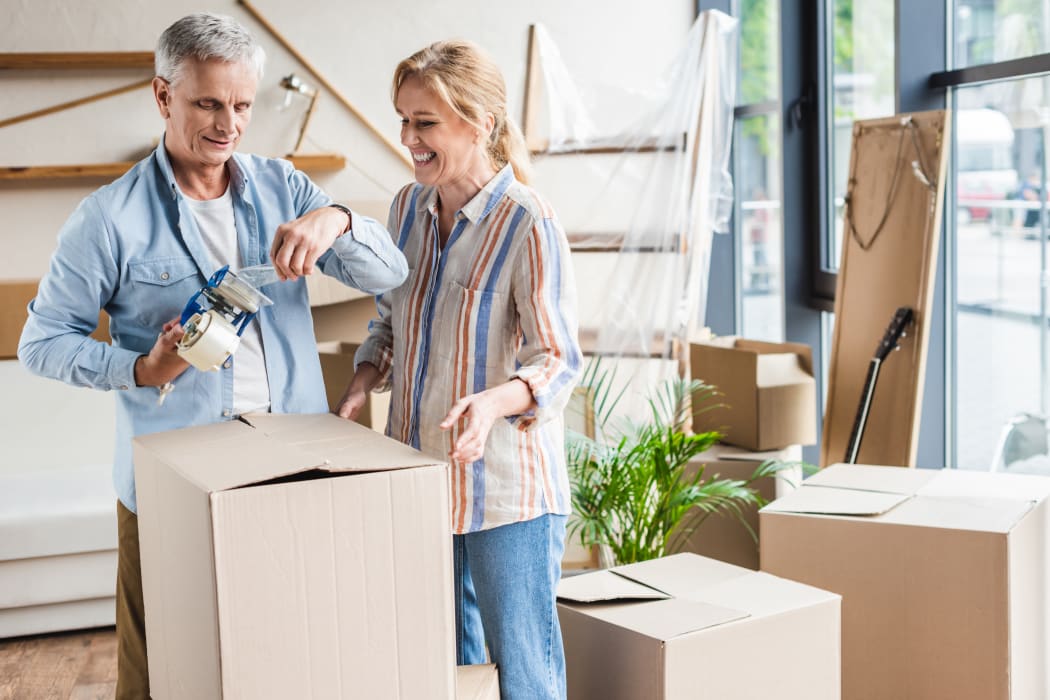 Family packing with boxes from Lockaway Storage in San Antonio, Texas