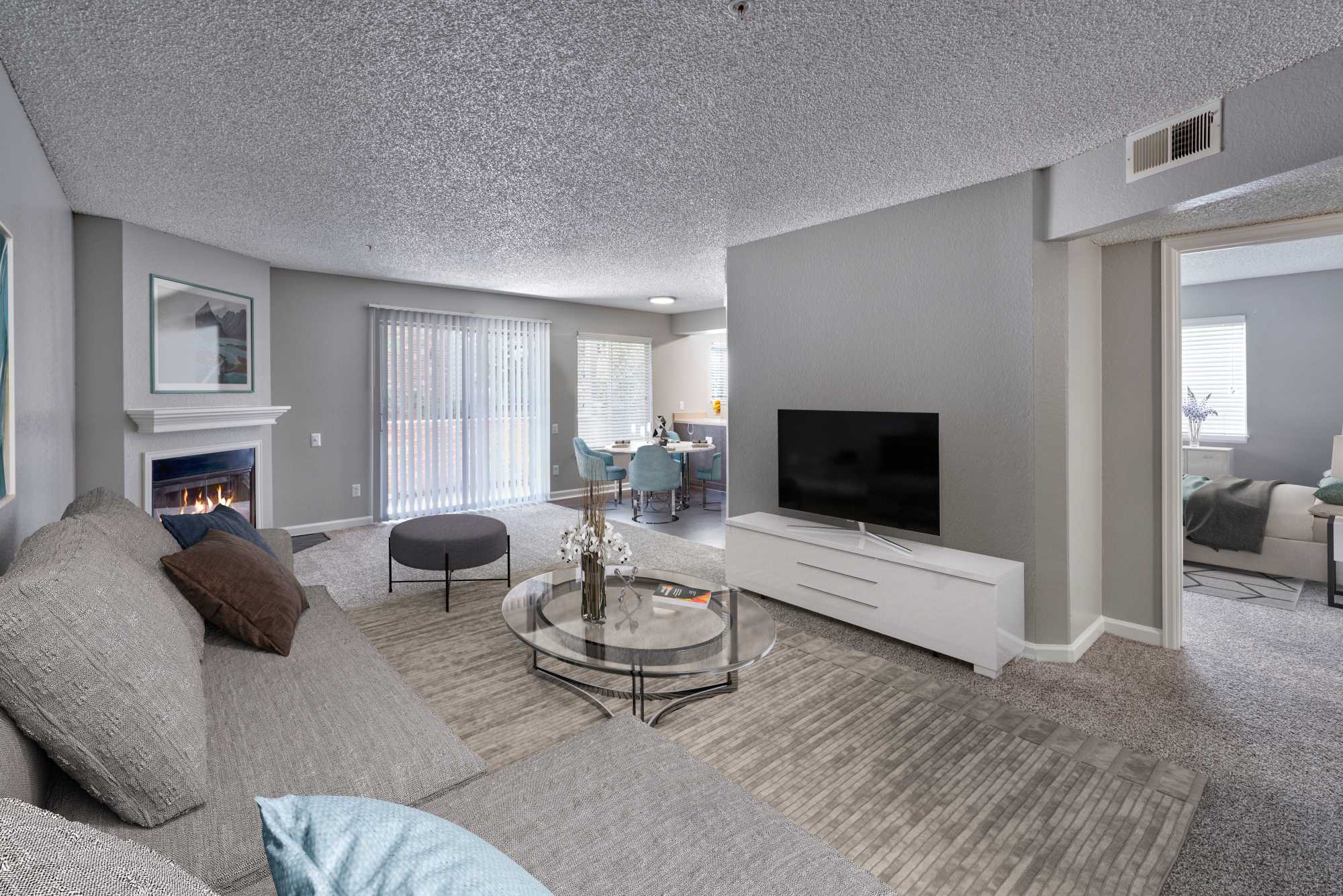Well-furnished modern living room at Arapahoe Club Apartments in Denver, Colorado