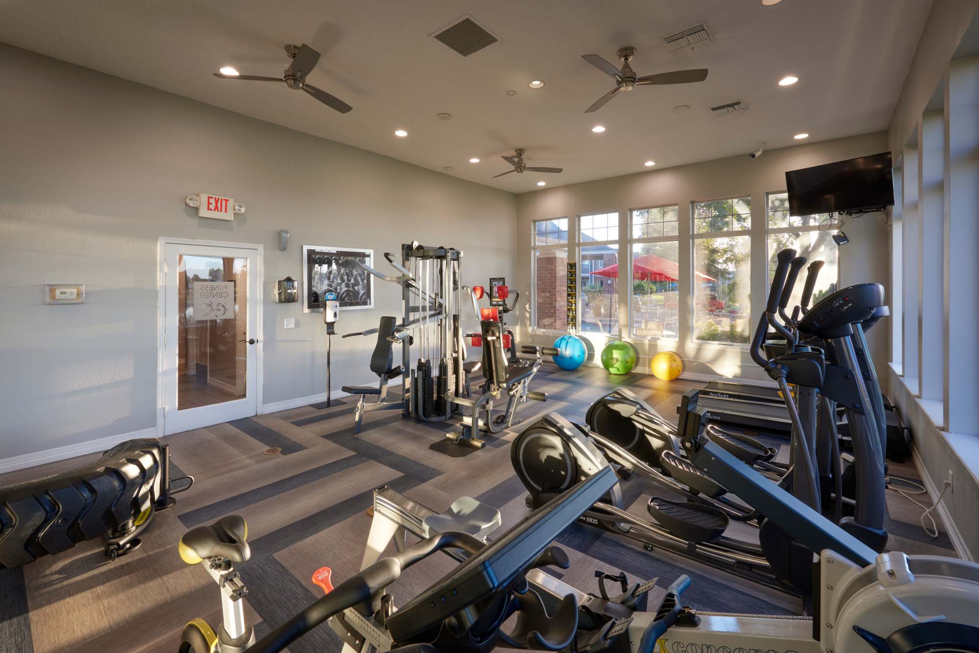 Well-equipped fitness center at Promenade at Hunter's Glen Apartments in Thornton, Colorado