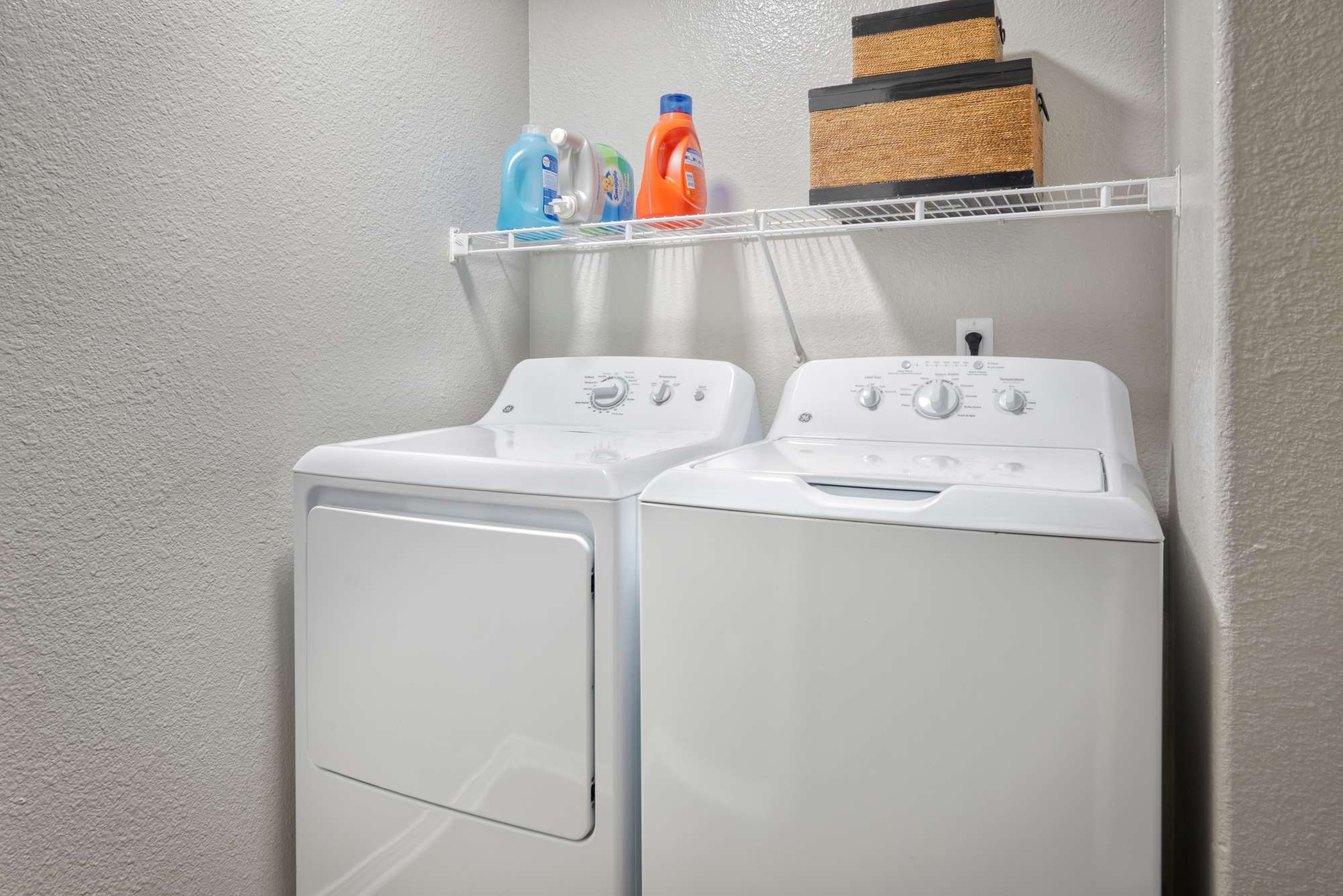 In-home washer and dryer at Promenade at Hunter's Glen Apartments in Thornton, Colorado