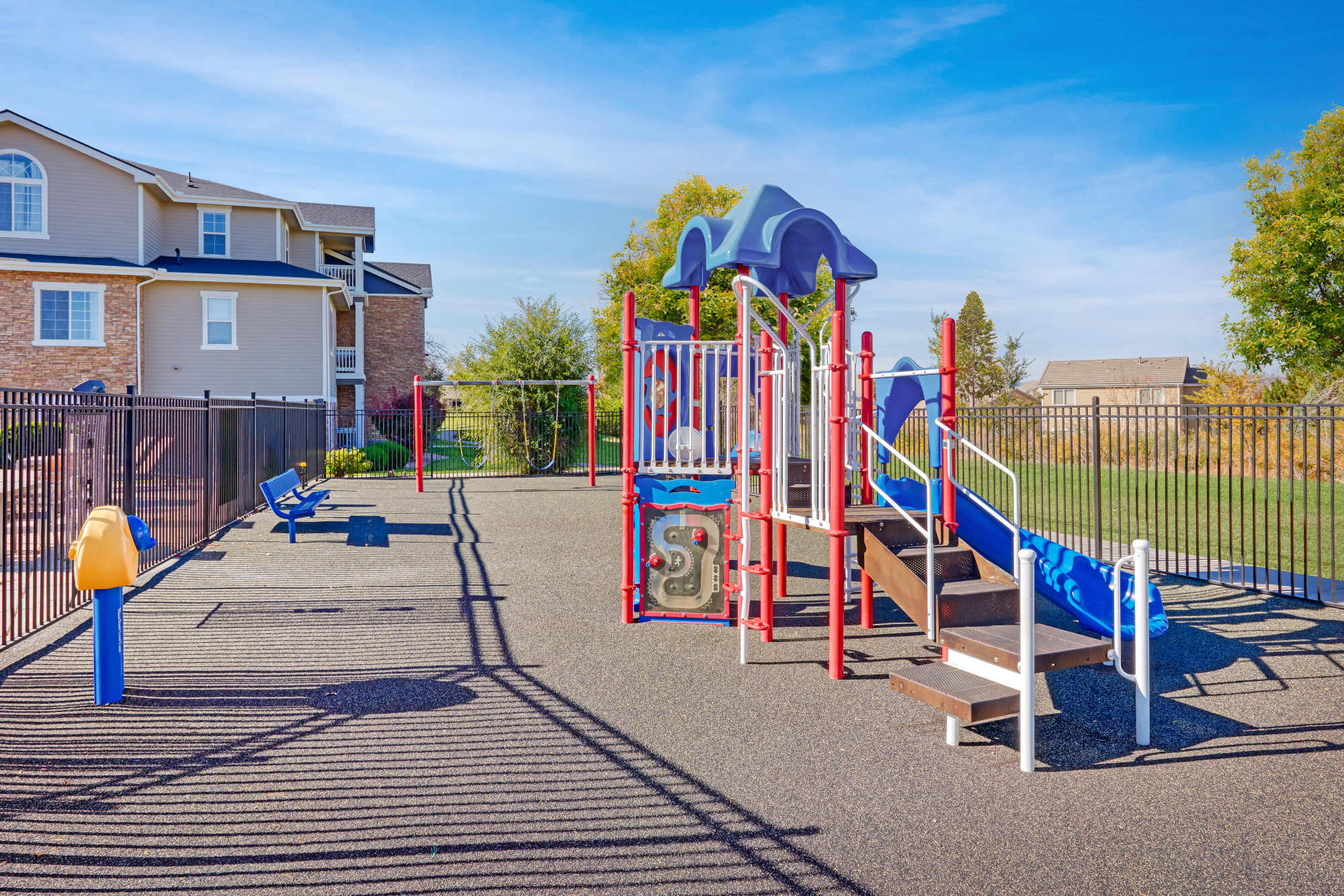 Playground with community view at Westridge Apartments in Aurora, Colorado