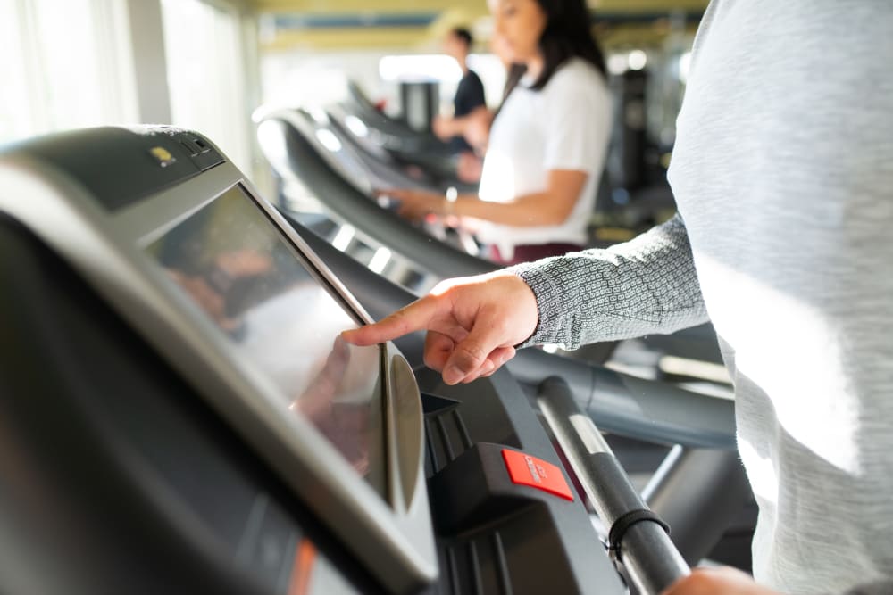 Residents working out in the fitness center at Ravenwood Heights in Tempe, Arizona