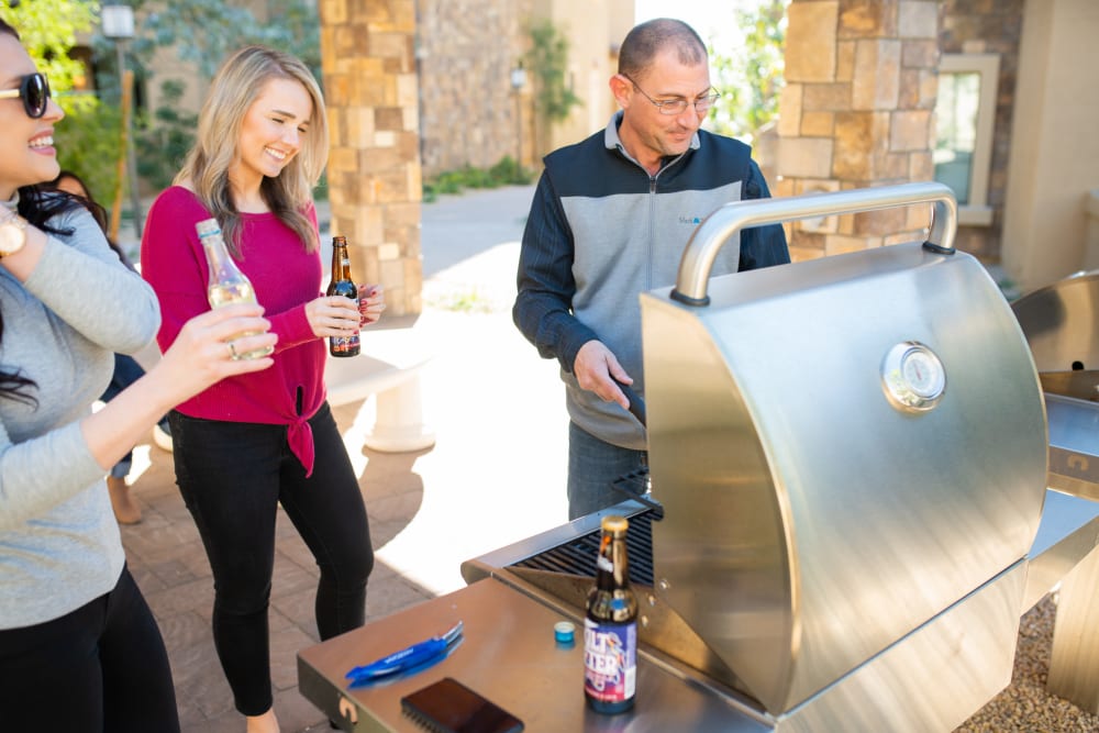 Residents grilling on the gas barbecues at San Pedregal in Phoenix, Arizona
