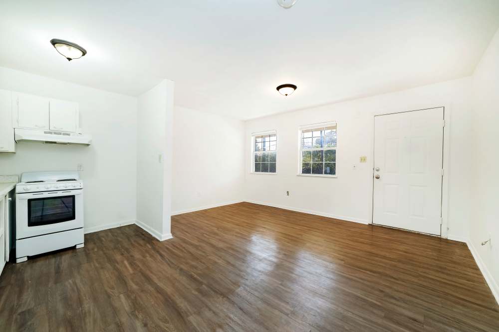 Living area with open kitchen at Magnolia Terrace in Tallahassee, Florida