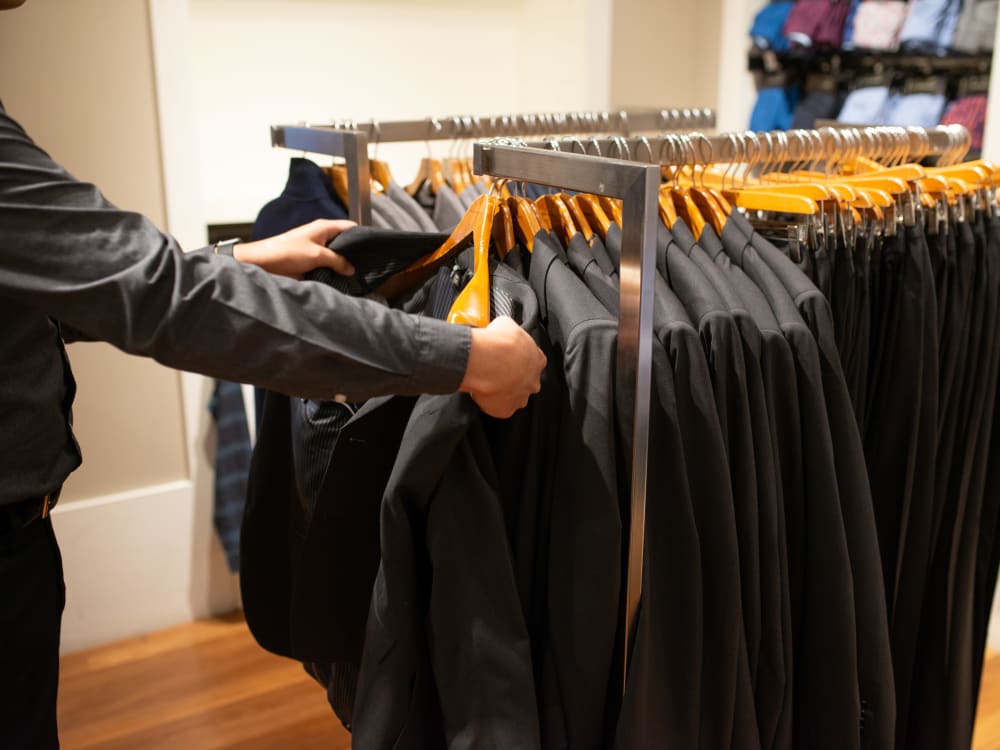 Resident shopping for a high-end suit near San Norterra in Phoenix, Arizona