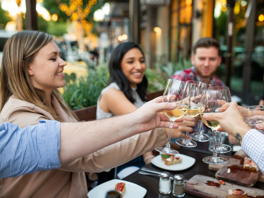 Residents enjoying a fine dining experience near San Palacio in Chandler, Arizona