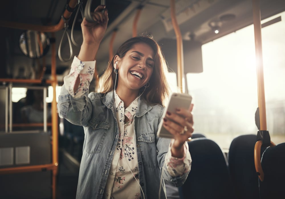 Resident riding the bus from a transit stop near Sofi Riverview Park in San Jose, California