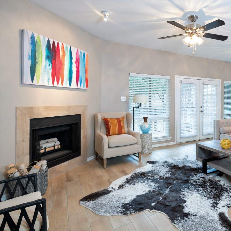 Fireplace in apartment home at The Quorum At Trophy Club in Trophy Club, Texas
