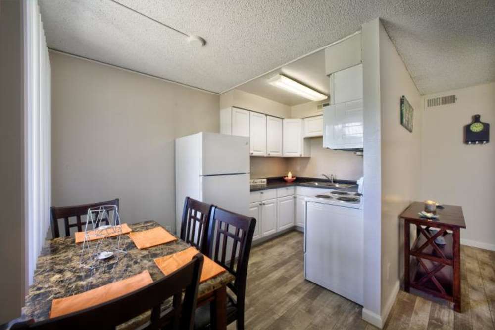 Dining area with view to kitchen at Howe in Sacramento, California