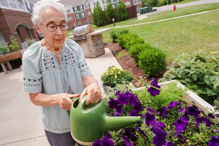 Resident gardening at Harmony Senior Services in Charleston, South Carolina