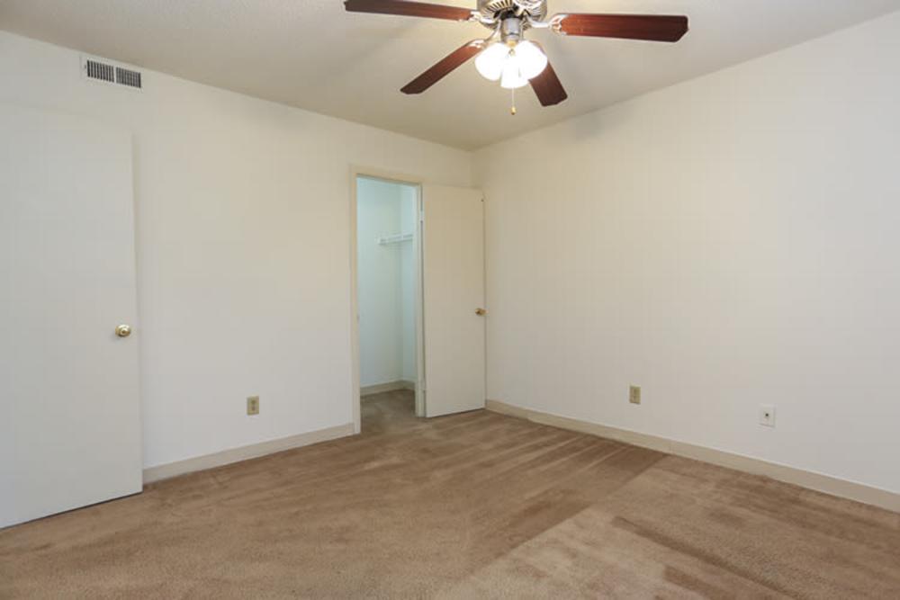 Bedroom with spacious walk-in closets at Landmark Apartments in Chesapeake, Virginia