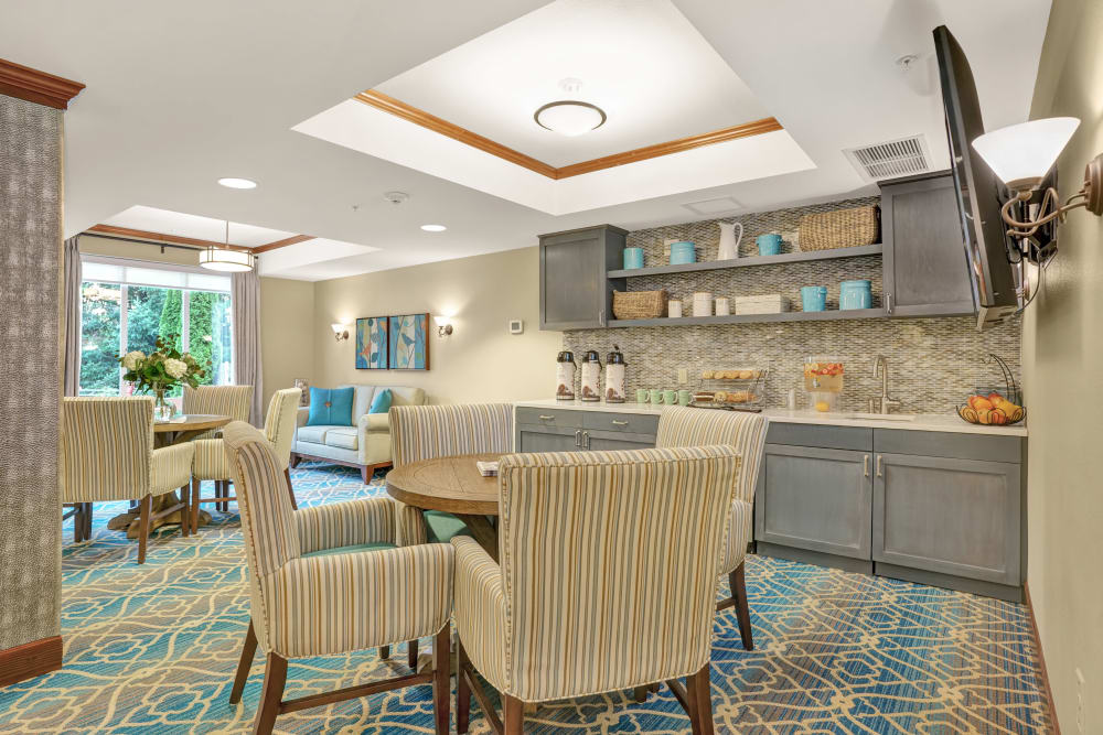 Community seating area with coffee and snacks at The Creekside in Woodinville, Washington