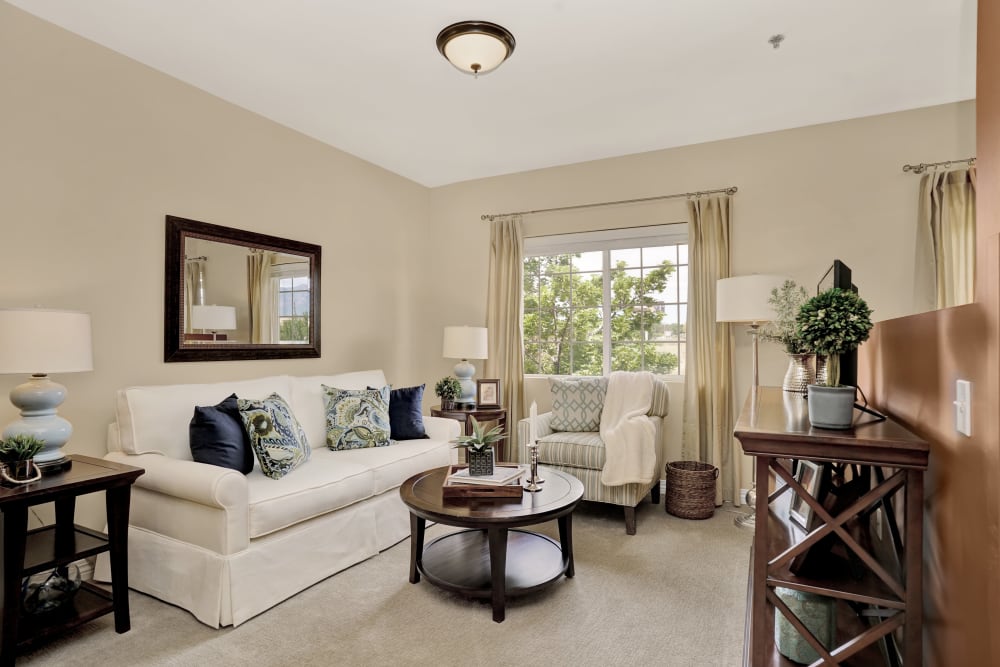 Elegant living room of apartment at Chancellor Gardens in Clearfield, Utah