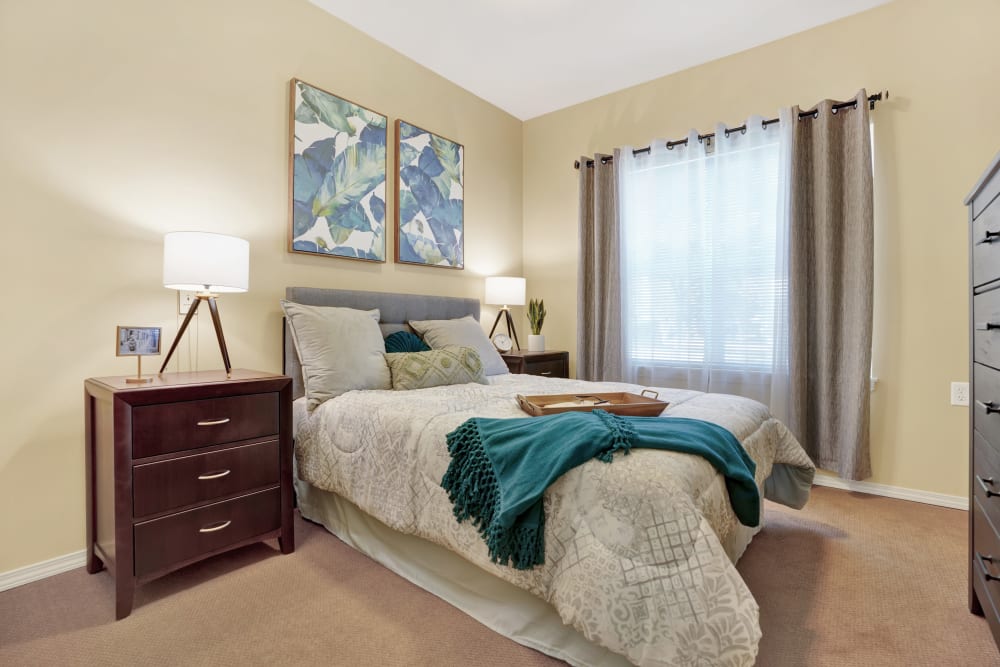 A serene bedroom in an apartment at Dale Commons in Modesto, California