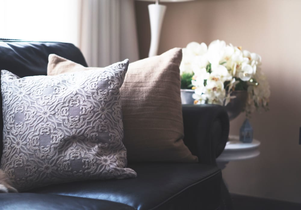 A couch in an apartment at Stoney Brook of Copperas Cove in Copperas Cove, Texas