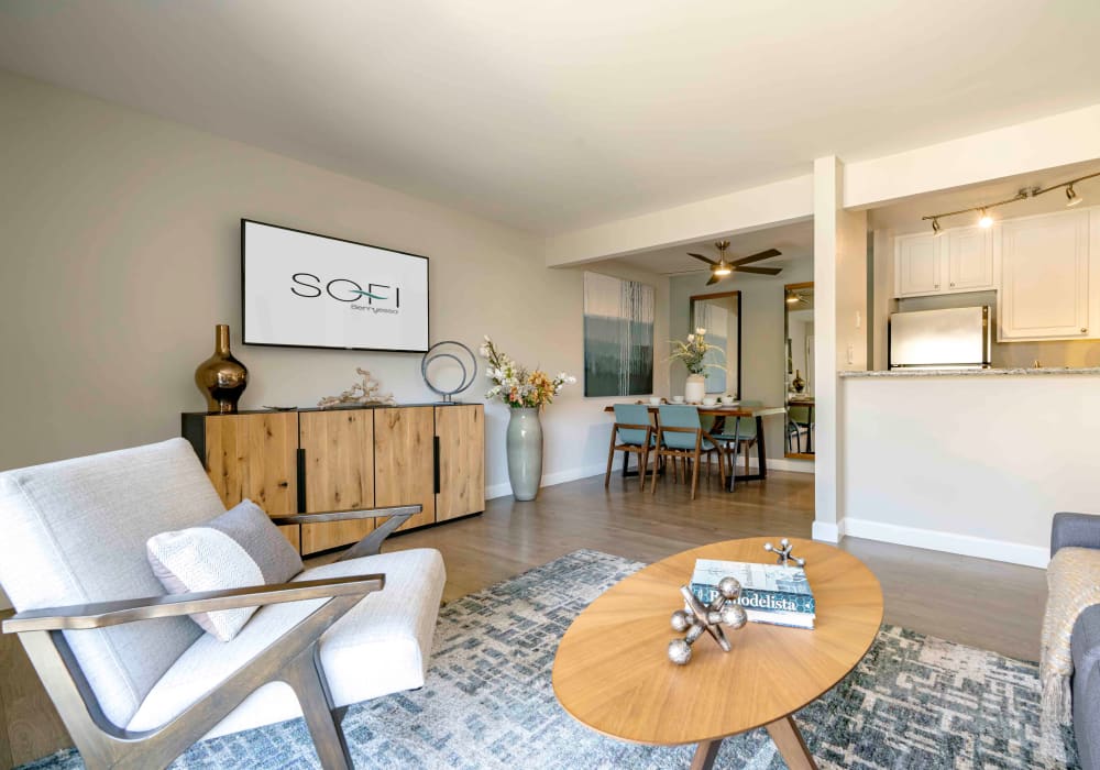 View of the living space of an open-concept model home at Sofi Berryessa in San Jose, California