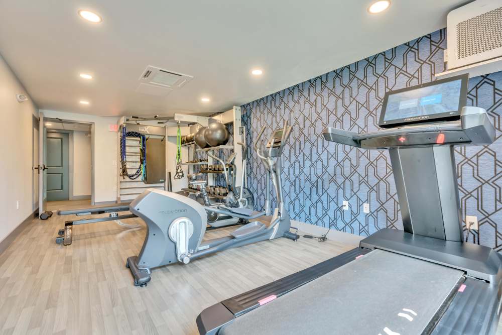 Gray exercise equipment in fitness room at Latitude at South Portland in Portland, Maine