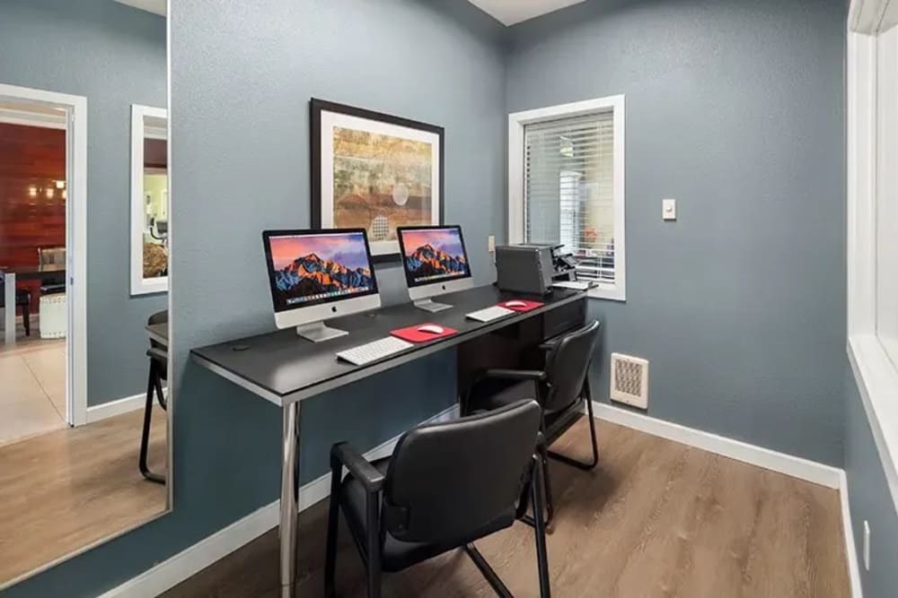 Desk with computers at Align Apartment Homes in Federal Way, Washington.