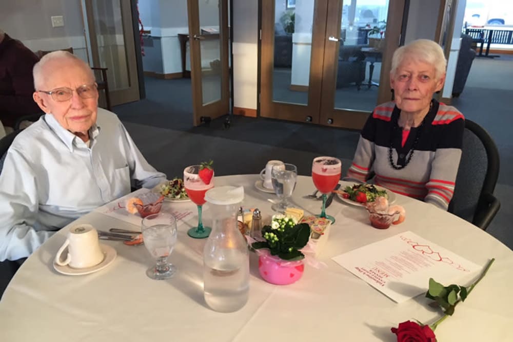 Resident couple enjoying a meal at The Lakeside Village in Panora, Iowa.