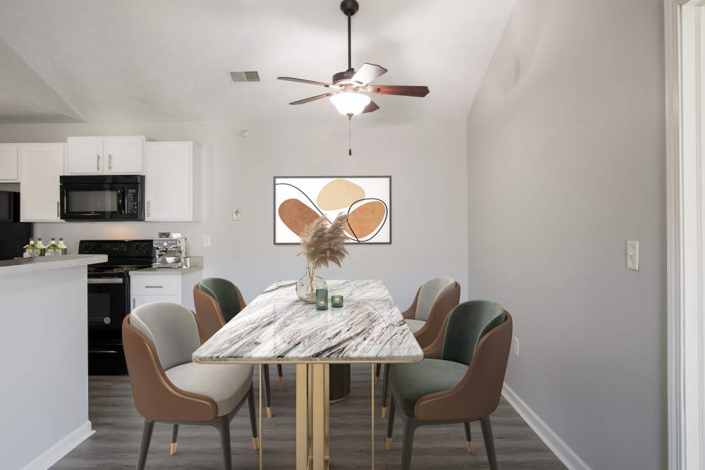 Kitchen with dining area and carpet flooring at Valley View Estates, Council Bluffs, Iowa