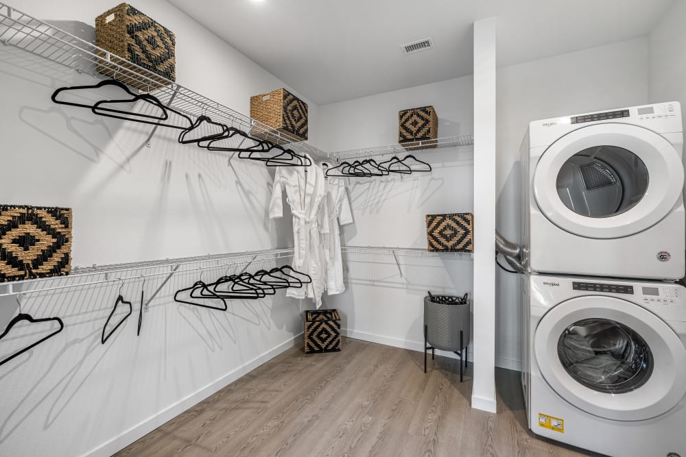Walk in closet with full sized washer and dryer Marq Promenade in Westminster, Colorado