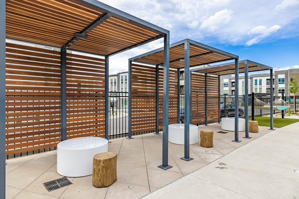 Outdoor poolside seating at Marq Promenade in Westminster, Colorado
