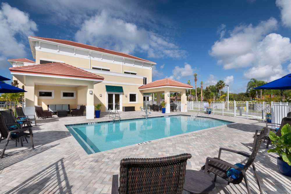 Community swimming pool at The Pineapple House at Sapphire Lakes in Naples, Florida
