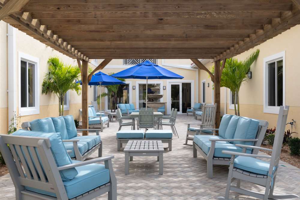 Community patio at The Pineapple House at Sapphire Lakes in Naples, Florida