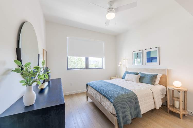Beautiful and spacious bedroom at South Pointe Apartments in Miami Lakes, Florida