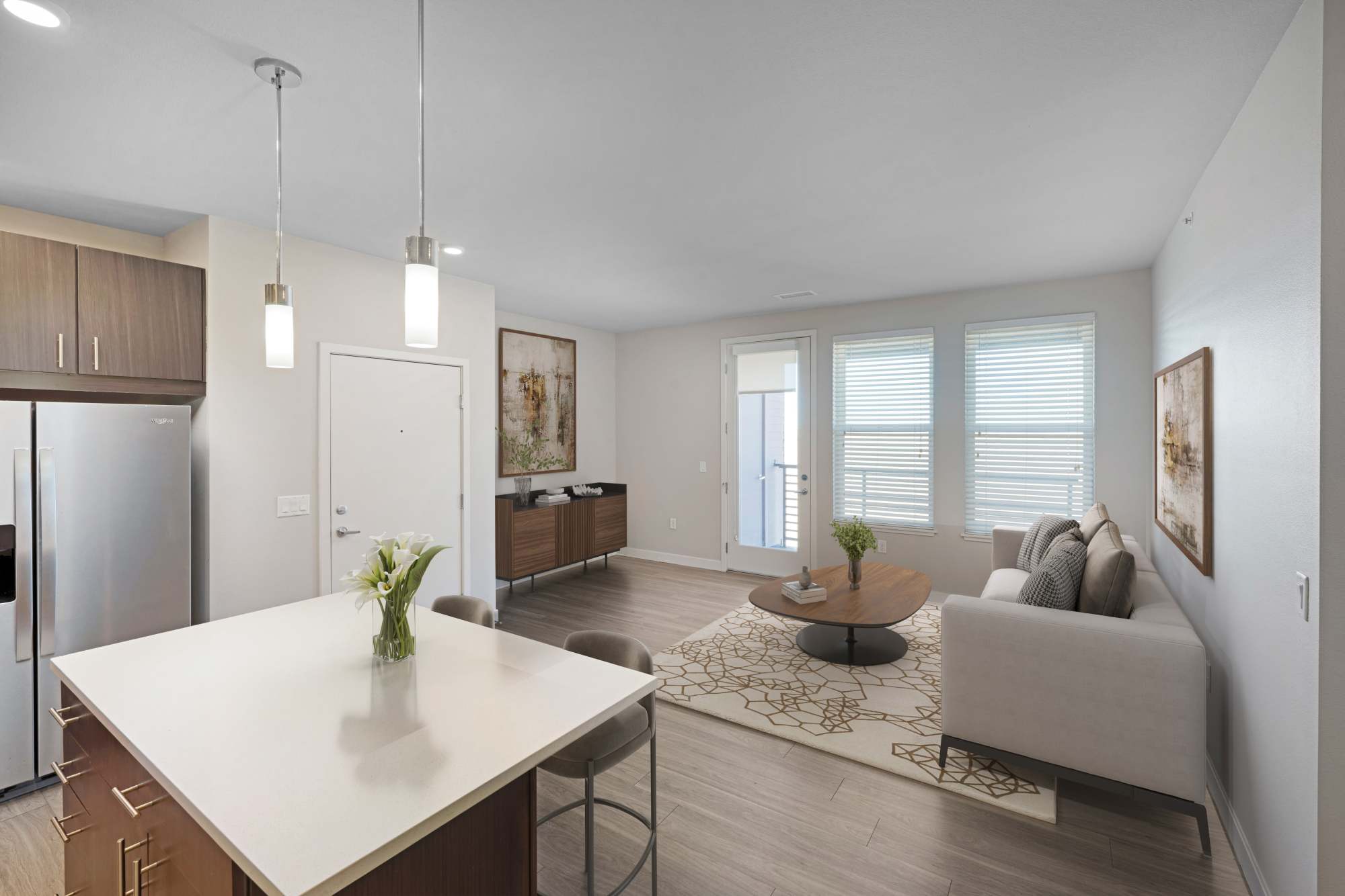 Kitchen with stainless-steel appliances at Strata Apartments in Denver, Colorado