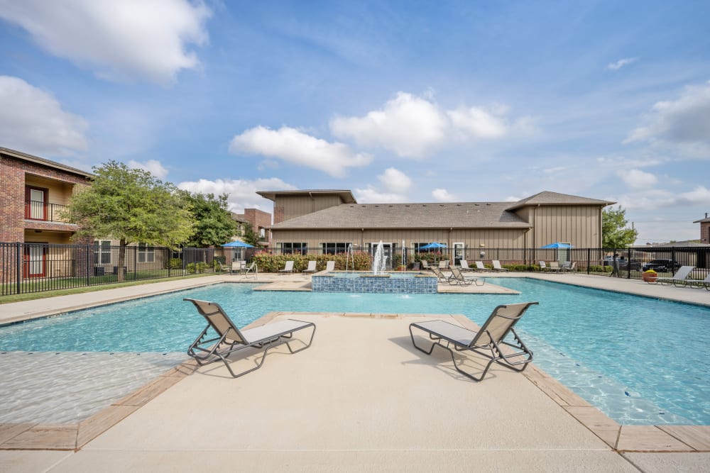 Sparking swimming pool and lounge area at Anatole at City View in Lubbock, Texas