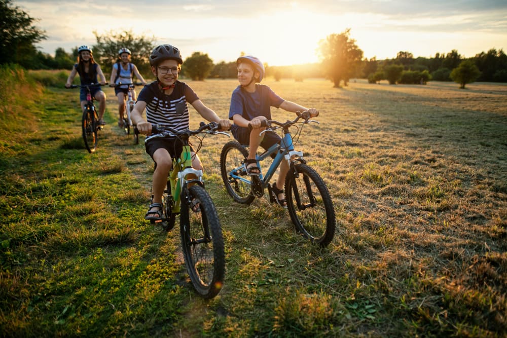 Children enjoying a bike ride at Satyr Hill Apartments in Parkville, Maryland