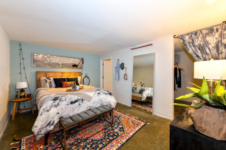 Spacious model bedroom at Canton Mill Lofts in Canton, Georgia