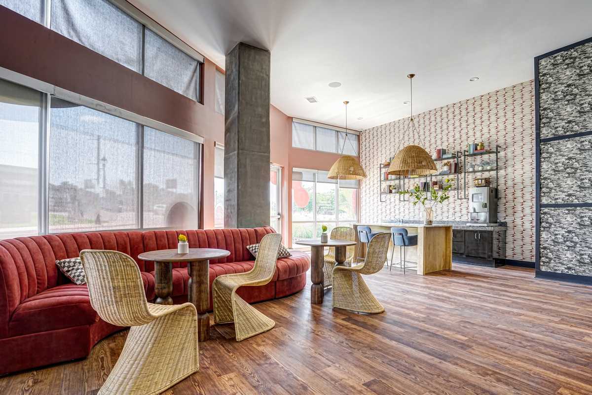 Community space with wood flooring at The Nine in Louisville. KY