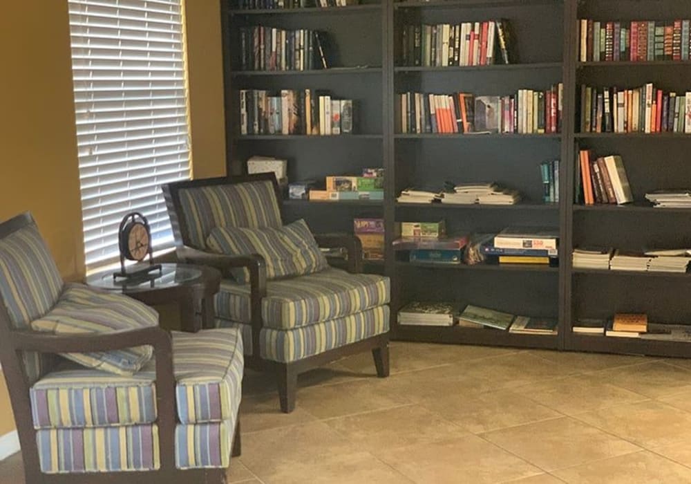 Bookshelves and reading area at Serenity Villas in Pomona, California