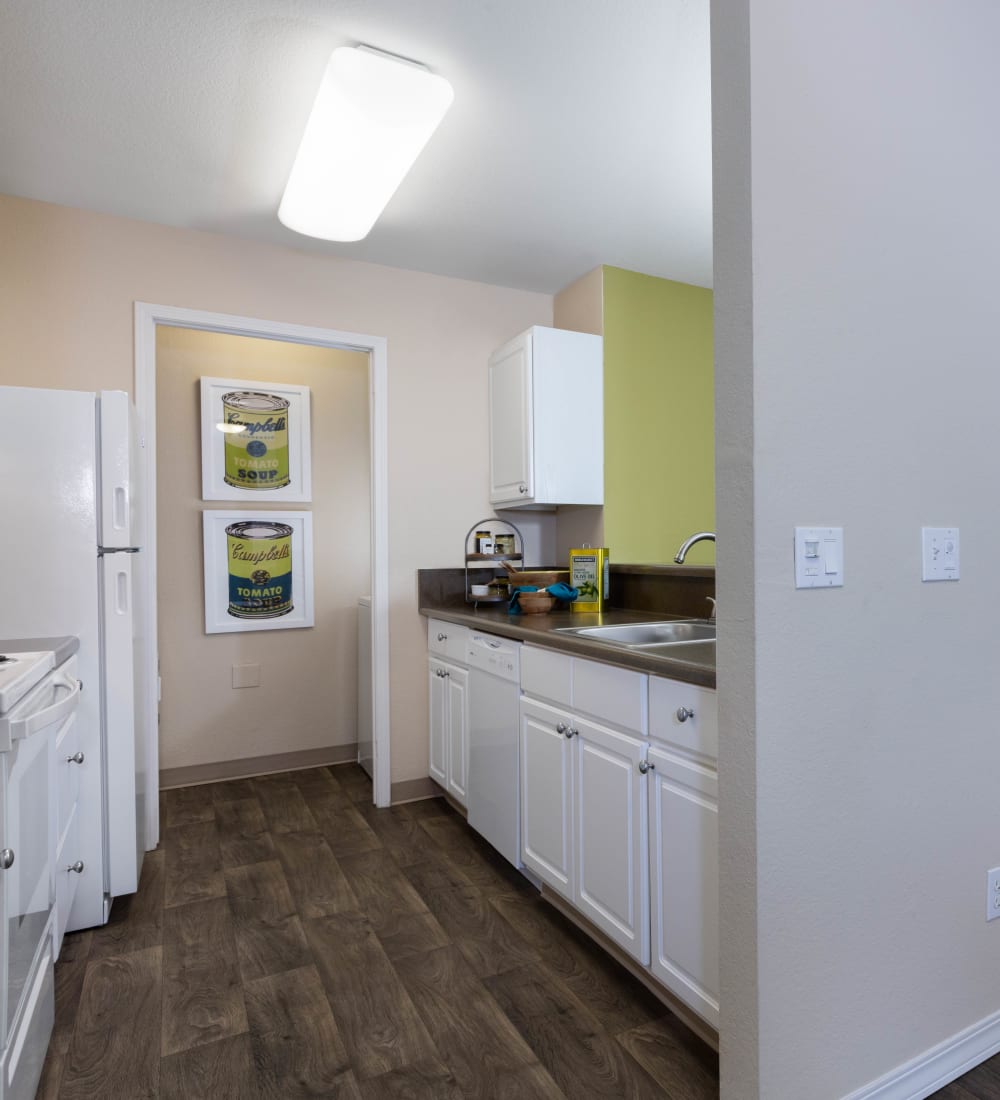 Well-decorated living area with an accent wall in a model home at Haven at Golf Creek in Portland, Oregon