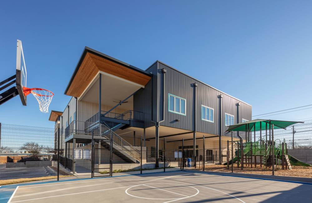 Basketball court and playarea for kids at Laurel Creek Apartments in Austin, Texas, 